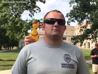 Police Academy Recruits Must Try Not to Laugh to Pass the Chicken Test VOANews.mp4