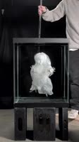 Floating ghost effect using a fish tank and a puppet.mp4