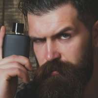 Bearded-Man-With-A-Perfume-Bottle.jpg