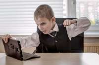 schoolboy-distance-learning-very-angry-annoyed-beats112397-591.jpg