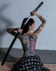 Dark-Full-body-japanese-yakuza-tattoo-for-girl.jpg