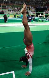 simonebiles2bythenownow1de706ob.jpg