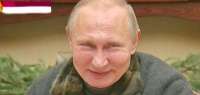Putin-smile-702x336.jpg