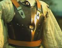 slow-motion-flintlock-musket-vs-plate-armour.webp
