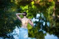 slim-young-woman-undresses-before-swimming-photo.jpg