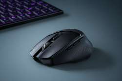 httpsmedias-p1.phoenix.razer.comsys-master-phoenix-images-containerh6ahb19904337944606250508-basilisk-mobile-black-1500x1000-3.jpg