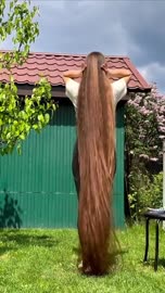 thisladyshowingoffhersuperlonghair-9dc1qkczm0ae1.mp4