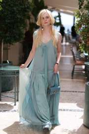 Elle-Fanning-Wore-Coach-During-Cannes-Film-Festival.jpg