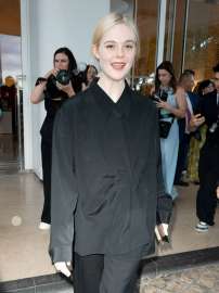 elle-fanning-leaves-hotel-martinez-in-cannes-05-22-2025-3.jpg