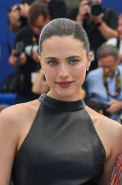 margaret-qualley-wears-chanel-leather-dress-at-cannes-2025-115e7753462d05cfb7.jpg