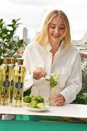 sophie-turner-s-hugo-spritz-summer-ferragamo-khaite-a-fresh-comeback-5.jpg