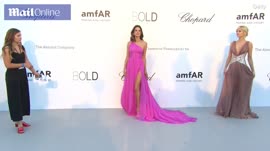Alessandra Ambrosio is a vision in floaty gown at amFAR.mp4