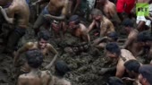 indians in cow dung.webm
