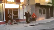 Rioters beat female shop owner as her husband tries to defe[...].mp4