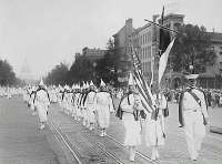 KuKluxKlanmembersmarchdownPennsylvaniaAvenueinWashington,D.C.in1928.jpg
