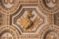 close-up-crowned-dragon-symbol-carved-marble-wall-inside-church-vatican-city-207348923.webp