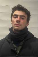 PhotoofLuigiMangionetakenbythePennsylvaniaStatePoliceinAltoona,PA.png