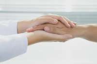 depositphotos14994909-stock-photo-two-holding-hands.jpg
