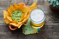 nachos-with-guacamole-beer-rustic58797-981.jpg