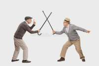 two-senior-man-sword-fight-canes-studio-shot-gentlemen-having-their-isolated-white-background-67837461.webp