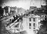 1838 Boulevard du Temple in Paris was taken by Louis Daguerre himself on a spring morning in 1838 from the window of the Diorama.jpg