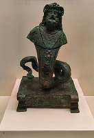 StatueofgodSarapisAmunAgathodaemon.jpg