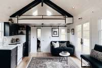 black-and-white-luxurious-tiny-home-kitchen-03.jpg